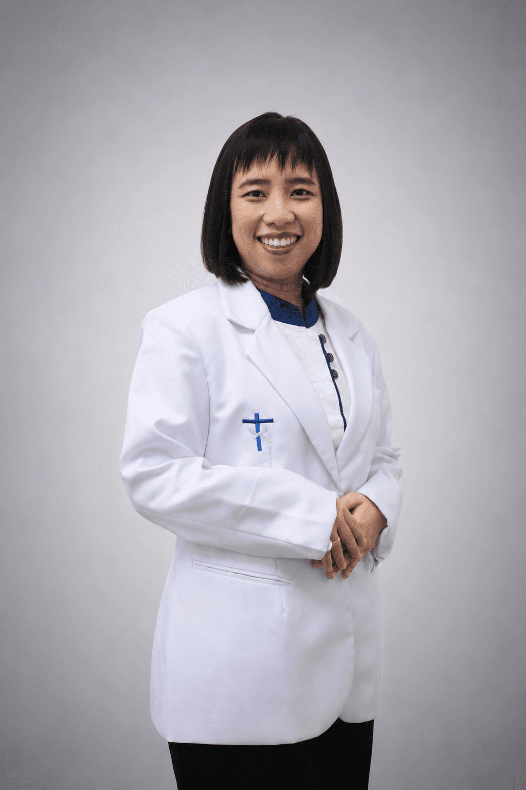 Evelyn Marlia Tanaya, dr. M.Kes